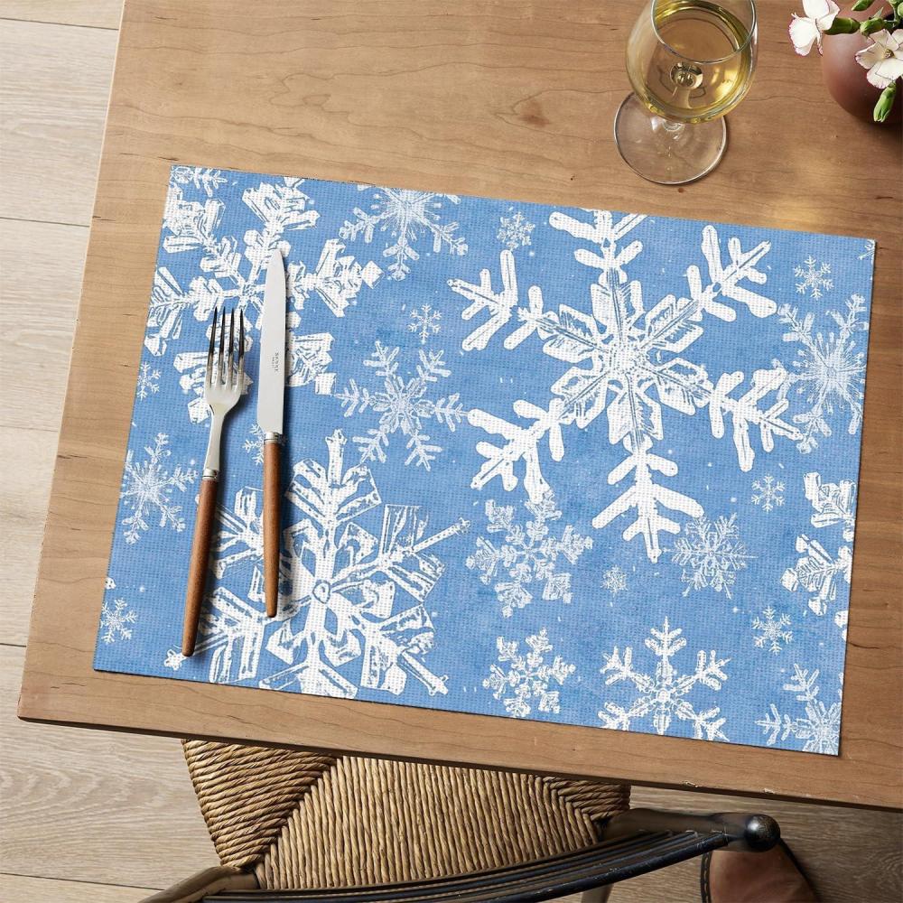 imageArtoid Mode Snowflakes Christmas Vinyl Placemats Set of 4 12x18 Inch Wipeable Navy Blue Winter PVC Woven Table Mats for Party Kitchen Dining DecorBlueWhite