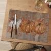 Artoid Mode Pumpkin Leaves Fall Vinyl Placemats Set of 4, Wipeable Woven PVC Table Mats for Thanksgiving Farmhouse Holiday Party Kitchen Dining Decor(Wood/Orange)