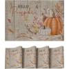 Artoid Mode Orange Hello Pumpkin Leaves Fall Vinyl Placemats Set of 4, Washable Woven Non-Slip Plastic Table Mats for Thanksgiving Holiday Party Kitchen Dining Decor(Wood)