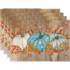 Artoid Mode Orange Pumpkins Eucalyptus Leaves Fall Placemats Set of 4, 12×18 Inch Seasonal Autumn Table Mats for Party Kitchen Dining Decoration(Wood/Blue)