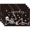 Artoid Mode Spooky Skeleton Halloween Placemats Set of 4, 12×18 Inch Seasonal Table Mats for Party Kitchen Dining Decoration(Black/Beige)