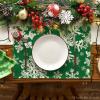 Artoid Mode Green Snowflakes Christmas Placemats for Dining Table, 12 x 18 Inch Seasonal Winter Washable Table Mats Set of 4(Green)