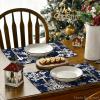 Artoid Mode Green Snowflakes Christmas Placemats for Dining Table, 12 x 18 Inch Seasonal Winter Washable Table Mats Set of 4(Navy Blue)
