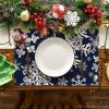 Artoid Mode Green Snowflakes Christmas Placemats for Dining Table, 12 x 18 Inch Seasonal Winter Washable Table Mats Set of 4(Navy Blue)