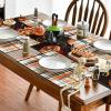 Artoid Mode Red Green Buffalo Plaid Christmas Placemats Set of 4, 12×18 Inch Seasonal Winter Table Mats for Party Kitchen Dining Decoration(Orange/Black)