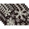 Artoid Mode Green Snowflakes Christmas Placemats for Dining Table, 12 x 18 Inch Seasonal Winter Washable Table Mats Set of 4(Black)