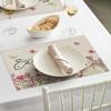 Artoid Mode Bunny Flowers Vinyl Happy Easter Placemats Set of 4, 12×18 Inch Wipeable Non-Slip Spring PVC Place Mats for Party Kitchen Dining Decor