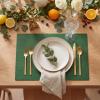 Artoid Mode Green Faux Leather Placemats Set of 4, 15 Inch Waterproof Wipeable Heat Resistant Vinyl Place Mats, Reversible Table Mats for St. Patrick’s Day Dining Decor(Green)