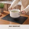 Artoid Mode Green Faux Leather Placemats Set of 4, 15 Inch Waterproof Wipeable Heat Resistant Vinyl Place Mats, Reversible Table Mats for St. Patrick’s Day Dining Decor(Black)