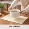 Artoid Mode Green Faux Leather Placemats Set of 4, 15 Inch Waterproof Wipeable Heat Resistant Vinyl Place Mats, Reversible Table Mats for St. Patrick’s Day Dining Decor(Beige)